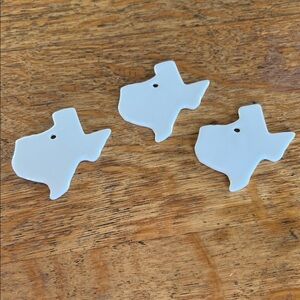 White Texas Shaped Charms